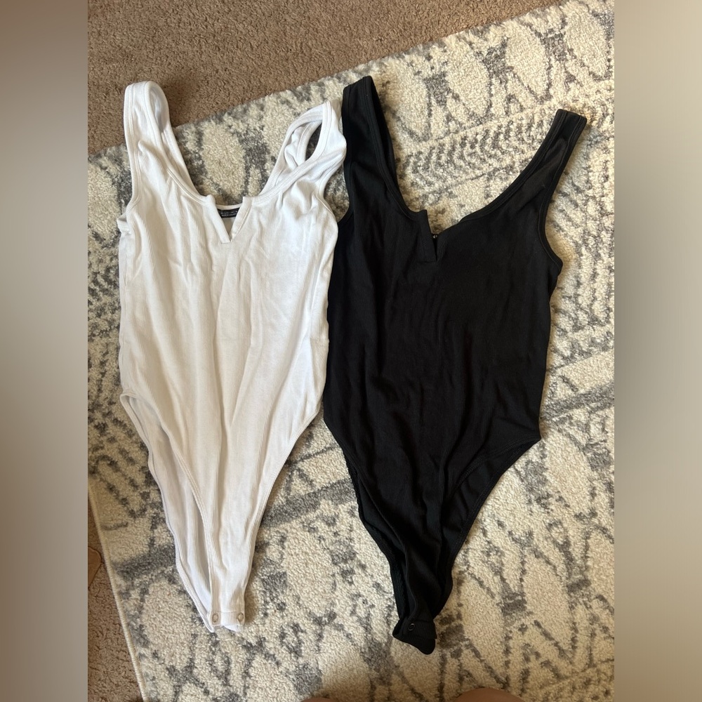 Black and white zara body suits. Perfect condition. new without tags.